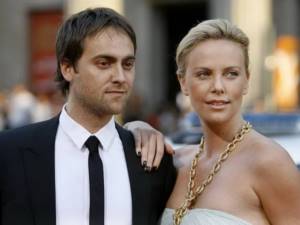 Actor Stuart Townsend and his girlfriend, a Hollywood film actress.