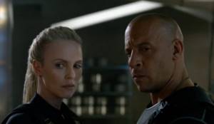 Actress Charlize Theron and Vin Diesel in the movie Fast and Furious.