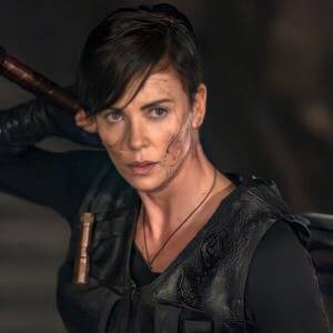 Actress Charlize Theron in the film The Immortal Guard with short hair.