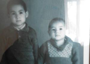 Batyrkhan Shukenov (left) with his brother as a child
