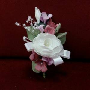 white boutonniere for groom