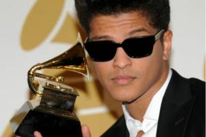 Bruno Mars with an award