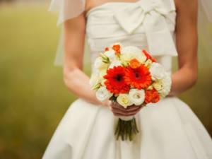 Bride&#39;s bouquet of white and red gerberas
