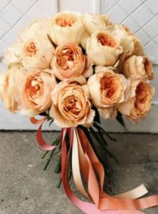 bridal bouquet of peony roses and freesias