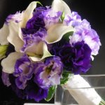 Bridal bouquet with lilac eustomas and callas
