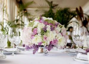 Bouquet with artificial flowers on the festive table