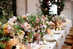 wedding decor with flower garlands, flower table runner