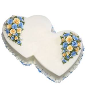 cake decor in the shape of two hearts for a wedding with flowers