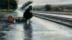 The girl is alone in the rain.