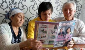 Dimash Kudaibergenov with his grandparents
