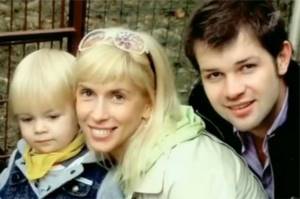Dmitry Miroshnichenko and Alena Sviridova with their son Grigory