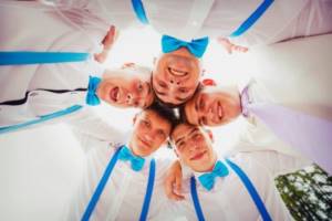 Groom&#39;s friends in a circle