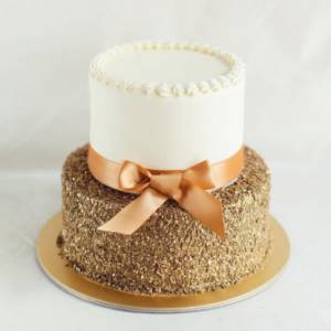 two tier cake with bow