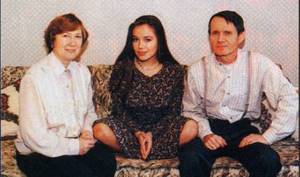 Ekaterina Rednikova with her parents