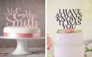 wedding cake figurines in the form of an inscription