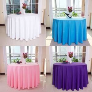 photo of wedding table decorations with colored tablecloths
