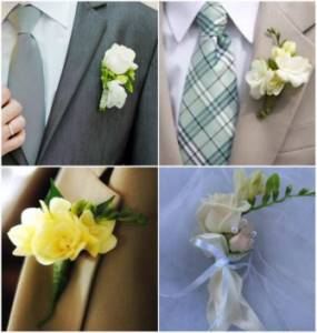 Freesia and bush rose in the groom&#39;s boutonniere