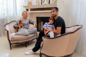 Football player Alexander Samedov with his wife, son and beloved pet