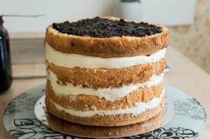 Naked cake with lemon-blueberry filling and curd cream