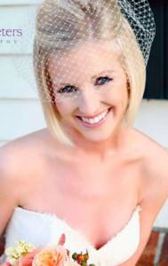 Classic wedding hairstyle for short hair for blondes with a veil