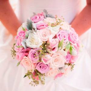 round bouquet in the hands of the bride