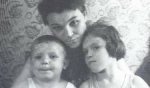 Little Misha Vorobyov with his mother and sister Olya