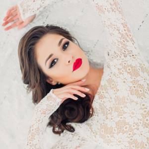 makeup with red lipstick for the bride