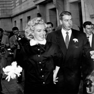 Marilyn Monroe in a modest dress at a wedding