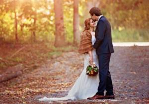 Cute autumn photo of newlyweds