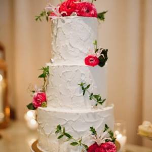multi-tiered cream cake on the wedding table
