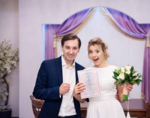 Newlyweds with a certificate