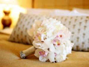 Mono-bouquet of white and pink orchids