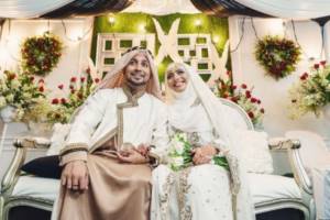 Muslim brides in wedding dresses