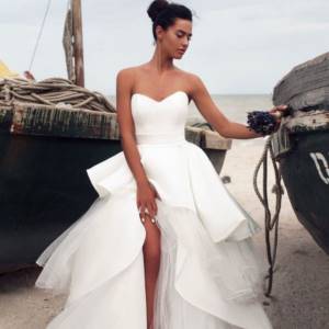 Bride at a photo shoot in a transformable wedding dress