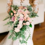 Bride with a beautiful cascading bouquet