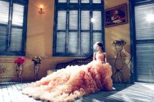 Bride in a peach dress