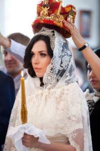 Bride in a wedding dress in the Orthodox Church