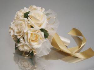 A delicate arrangement of roses is a wonderful option for a stand-in bouquet