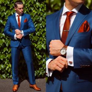 image of the groom in a blue wedding suit