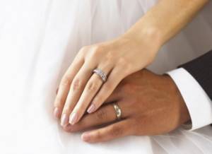 wedding ring on left hand