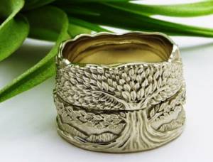 Wedding rings with a branchy tree - as a symbol of a strong family