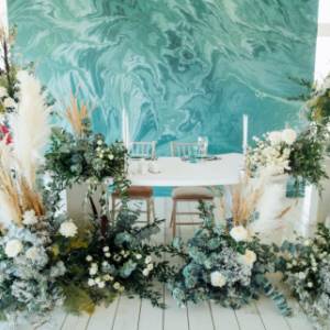 Decoration of the newlyweds&#39; table in turquoise tones. Agency &quot;Plombir Wedding&quot; 