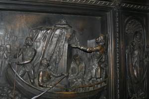 Peter I transports the relics of Alexander Nevsky to St. Petersburg. Relief on the door of St. Isaac&#39;s Cathedral 