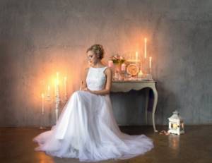 Staged photo of the bride during studio shooting