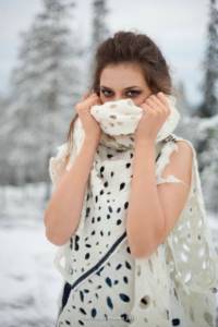 poses for a photo shoot in winter