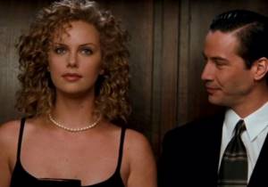Charlize&#39;s hairstyle in the film The Devil&#39;s Advocate. Charlize Theron and Keanu Reeves. 
