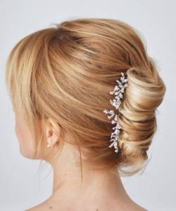 Simple shell hairstyle with loose strands