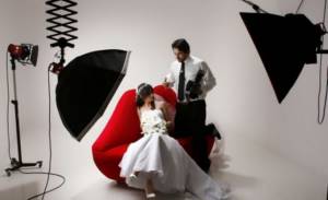 Photographer&#39;s work at a studio wedding photo shoot
