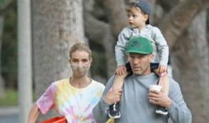 Rosie and Jason with their son on a walk