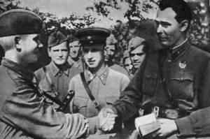 With the beginning of the Great Patriotic War, he took part in the mobilization of the population into the Red Army and was involved in the evacuation of industry. Then he serves in political positions in the active army. In the photo: Brigade Commissar Brezhnev presents a party card to a fighter. 1942 